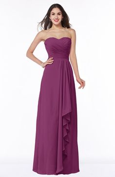 a woman wearing a strapless purple bridesmaid dress with ruffles on the skirt