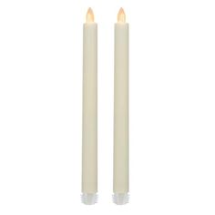 two white candles with one light on each side