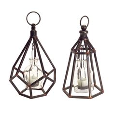 two metal hanging lanterns with candles inside one is open and the other has an empty candle in it