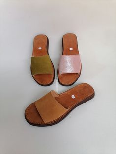 A beautiful 100% handcrafted women's sandal made with real leather and high quality organic material, perfect for sunny days, it is very comfortable and elegant. Soft and light, it is entirely handmade All manufacturing stages are carried out by hand All sizes are available ALL ORDERS ARE NOW SHIPPED VIA ARAMEX EXPRESS WORLDWIDE (please include a phone number at checkout, as it is required by the carrier). If you are unsure of your size, please contact me so I can help you. Wholesale Opportunities We also do wholesale sales at exceptional prices. Bespoke and personalized orders You want a tailor-made item, contact us directly and make your wish come true. Leather Sole Open Toe Barefoot Sandals, Summer Leather Closed Toe Mules, Handmade Leather Flip Flops For Summer, Summer Barefoot Sandals With Leather Sole In Natural Color, Summer Footbed Sandals In Natural Color, Handmade Leather Mules For Summer, Summer Natural Barefoot Sandals With Leather Sole, Natural Footbed Sandals For Summer, Summer Natural Color Footbed Sandals