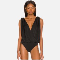 Free People Intimately 'Night Owl' Bodysuit Brand New With Tags Attached - No Faults Love This But It Does Not Fit Me ): Size: Medium Color: Black An Apparel That Fits You Well! The Free People Night Owl Bodysuit Keeps It Chic And Minimal. Plunging V-Neckline And Sleeveless Style. Pull-On Style. V Back. 98% Polyester, 2% Elastane. Info: Originally: $68 V-neck Bodysuit For Night Out With Lined Body, Backless Solid Bodysuit For Date Night, Solid Backless Bodysuit For Date Night, Backless Solid Color Bodysuit For Date Night, Solid Color Backless Bodysuit For Date Night, Flirty Black Swimwear For Night Out, Sleeveless Flirty Bodysuit For Date Night, Flirty Sleeveless Bodysuit For Date Night, V-neck Bodysuit With Lined Body For Night Out