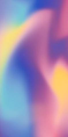 an abstract blurry background in blue, pink and yellow