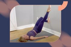 a woman doing a yoga pose on a mat