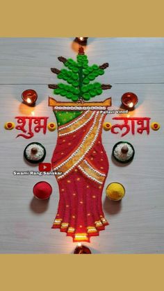 a decorated diya with candles and decorations