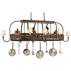 a chandelier with pots and pans hanging from it's side,