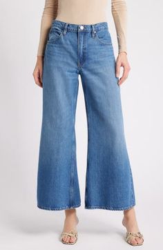 Sport a vintage-chic vibe in these faded nonstretch-denim jeans made with a high waist and full-length wide legs that have a slight flare. 27 1/2" inseam; 29" leg opening; 11 1/2" front rise; 14" back rise (size 29P) Zip fly with button closure Five-pocket style 100% recycled cotton Machine wash, dry flat Imported Light Wash Wide Leg Flares For Spring, Classic Faded Wide Leg Bottoms, Spring Flares With Five Pockets In Full Length, Spring Full-length Flares With Five Pockets, Spring Full Length Flares With Five Pockets, Chic Medium Wash Straight Leg Flares, Retro Wide Leg Light Wash Flare Jeans, Faded Wide Leg Cropped Jeans, Vintage Wide Leg Cropped Jeans For Spring