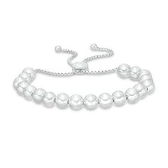 Dress her wrist in the luxury of this beaded bolo bracelet. Crafted in sterling silver, this shimmering design features a bright row of high-polish beads. She can wear one, two or more to create a look all her own. Buffed to a brilliant luster, this easy-on box chain bracelet adjusts up to 9.0 inches in length and secures with a bolo clasp and ball ends. Classic Adjustable Sterling Silver Bracelet With Polished Beads, Adjustable Polished Beads Sterling Silver Bracelet, Classic Adjustable Beaded Bracelets With Silver Beads, Adjustable Silver Sterling Tennis Bracelet, Adjustable Silver Sterling Silver Tennis Bracelet, Adjustable Silver Tennis Bracelet For Everyday, Formal Adjustable Beaded Bracelets With Polished Beads, Elegant Beaded Bracelets With Sliding Knot, Adjustable Polished Beads Bracelets For Formal Occasions