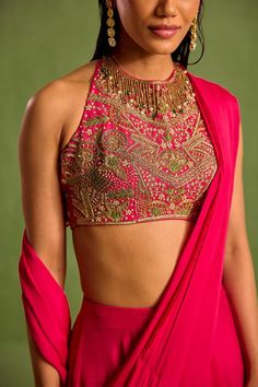 Pink pre draped saree in a solid draped base. Comes with dabka embroidered padded blouse, embellished by sequins, beads and pearl tassels on neckline. - Aza Fashions Festive Embroidered Draped Blouse Piece, Traditional Silk Tops With Mirror Work, Embellished Silk Blouse Piece For Reception, Elegant Embroidered Draped Choli, Elegant Draped Embroidered Choli, Festive Draped Silk Blouse, Evening Blouse With Intricate Embroidery In Georgette, Evening Georgette Blouse With Intricate Embroidery, Evening Embroidered Georgette Blouse