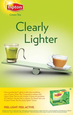 an advertisement for lipton green tea on a scale with a cup of tea and saucer