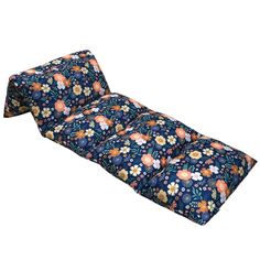 a blue and orange flowered seat cushion with an attached pillow on the bottom side