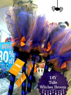 purple and orange tulle witch brooms with 30 % off sale sign in the background