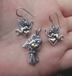 ********This sterling silver angel Earrings measure:1-1/4" from the top of the earwire to the bottom of the angel.Width of the angel at the widest part is almost 3/4" or 31mm x 18mmThe heart is gold filled.Price is for the pair of earrings at $21.95******** This Sterling Silver Angel pendant measures: just over 1-1/4"(from top of the angel to the bottom) x 5/8" at the widest part. or 33mm x 19mmThe heart is gold filled.Price is for one pendant at $18.95******************************************* Chunk Jewelry, Valentines Idea, Angel Earrings, Dream Aesthetic, Angel Pendant, Jewelry Lookbook, The Angel, Pearl Drop, Cute Jewelry