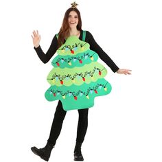 a woman in a green christmas tree costume is posing for the camera with her hands out