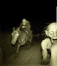 two creepy looking people riding horses in the dark