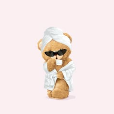 a brown teddy bear wearing sunglasses and a white towel on its head, sitting in front of a pink background