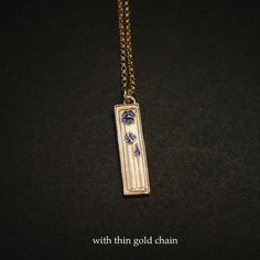 This daisy necklace is hand carved in the Mackintosh style and very dainty and elegant.Daisy is the birth flower of the month of April.Daisies symbolize innocence and purity. This stems from an old Celtic legend. According to the legend, whenever an infant died, God sprinkled daisies over the earth to cheer the parents up.In Norse mythology, the daisy is Freya’s sacred flower. Freya is the goddess of love, beauty, and fertility, and as such the daisy came by symbolize childbirth, motherhood, and Spiritual Flower Engraved Necklace, Dainty Brass Necklace With Flower Pendant, Dainty Brass Flower Pendant Necklace, Minimalist Flower-shaped Engraved Necklaces, Minimalist Flower-shaped Engraved Necklace, Minimalist Flower Engraved Necklace, Brass Pendant Necklace With Flower Charm, Etched Flower Pendant Necklace For Gift, Vintage Birth Flower Pendant Necklace