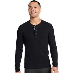 The Jockey Long Sleeve Waffle Henley men's top provides warm comfort with knit fabric and rib cuffs. A three-button style offers adjustable coverage and a classic look. With a semi-relaxed fit and a slight stretch, this waffle shirt is ideal for lounging or heading out in colder weather. Ribbed Cotton Long Sleeve Henley, Classic Long Sleeve Henley For Winter, Ribbed Long Sleeve Cotton Henley, Casual Winter Henley With Button Closure, Long Sleeve Cotton Henley With Ribbed Cuffs, Cotton Long Sleeve Henley With Ribbed Cuffs, Winter Crew Neck Henley With Buttons, Winter Long Sleeve Henley For Layering, Casual Cotton Henley With Button Cuffs