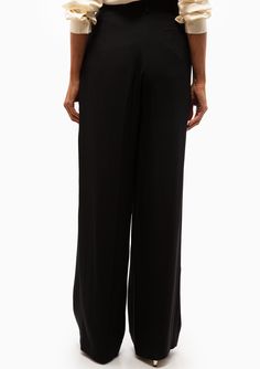 With their high waist, large darts and flowing, relaxed shape, the Bjorn trousers from Vanessa Bruno are this season's trouser suit. Made in a viscose blend, these oversized boyish trousers stand out for their relaxed and easy style. These wide leg tailored trousers feature a deep pleat on the front and back of lefts with a zip and hook fastening and inner button. Worn with the Virginia jacket and Benson cardigan, this is the must-have three-piece of the moment. 73% Acetate, 27% Viscose Dry Clea Trouser Suit, Easy Style, Vanessa Bruno, Trouser Suits, Tailored Trousers, Three Piece, Simple Style, Virginia, High Waist