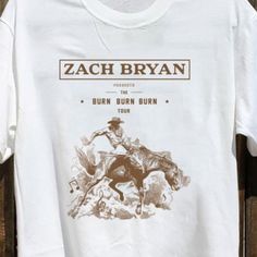 Unisex Sizing 100% Ring-Spun Cotton Runs True To Size Classic Fit Zach Bryan Clothes, Zach Bryan Sticker, Burn Burn Burn Zach Bryan, Zach Bryan Concert, Swiftly Tech Short Sleeve, Zach Bryan, 2024 Christmas, White Crew Neck, Fan Shirts