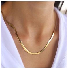 Elegant Gold Snake Chain Necklace, Herringbone Chain Necklace, Flat Snake Chain Choker, 14k Gold Plated, 925 Sterling Silver Discover the epitome of sophistication with our premium 925 Sterling Silver Necklace. Designed for the modern woman, our flat snake bone chain necklace exudes a luxurious aura that’s both timeless and contemporary. Embrace the essence of fashion with a piece that's in vogue, making a subtle yet bold statement. Key Features: Luxurious 925 Sterling Silver: Crafted with high- Snake Chain Gold, Flat Snake Chain, Gold Herringbone Chain, Herringbone Chain Necklace, Gold Snake Chain, Herringbone Chain, Herringbone Necklace, Snake Chain Necklace, Gold Rope Chains