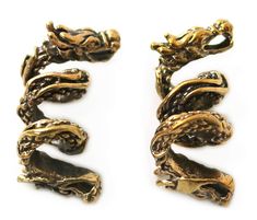 PRICES MAY VARY. Pack of 2 peices of Bronze Norse Irish Viking dragon beads rings design, solid pieces quality Great for beards beads rings, dreadlock or pirate or medieval braid hair beads ornament styles Good quality Bronze ; Lead, cadmium and nickel free Approximately Hole 5 mm x Width 11 mm x Length 2.90 cm or 1.14 Inch Imported, Thailand origin ; Direct from Amazon warehouse 
Good quality Bronze
Amazon return policy 
Direct from Amazon warehouse 
Actual color may be vary from the pictures d Medieval Hair, Beard Rings, Lagertha Hair, Hair Braid Beads, Medieval Hairstyles, Beads Rings, Beard Beads, Viking Dragon, Viking Beard