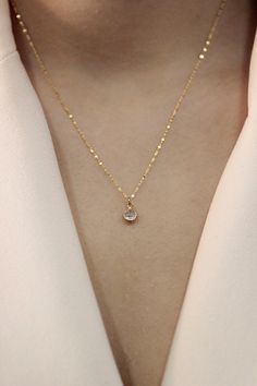 14K Gold Sequin Faceted Chain Necklace, Zircon Stone Necklace, Dainty Necklace, Minimalist Zircon Necklace About Product: * Every package comes with unique charm as a gift. * Chain is made of 100% 14K Solid Gold. * Chain weight is 0,82 grams for 40 centimeters. * The package includes product certificate. * Every package comes in a special gift box. * Available in different chain lengths. * The product color is golden yellow. PRODUCTION: We are jewelry artisans and manufacturers. Every Jewelry is made from the very scratch, and made by hand and carefully polished especially for you. You can know that you're getting high quality hand-made crafted jewelry when you purchase items. The brilliant ring is made to order by 14K white gold (solid gold / rose gold / yellow gold can be made ) and the Minimalist Round Chain Necklace With Diamond Cut, Minimalist Diamond Cut Chain Necklace As Gift, Minimalist Cubic Zirconia Chain Necklace As Gift, Minimalist Round Diamond Cut Chain Necklace, Minimalist Diamond Cut Chain Necklace, Minimalist Diamond Chain Necklace As A Gift, Minimalist Diamond Necklace With Round Pendant And Clavicle Chain, Delicate Diamond Chain Necklace Gift, Delicate Diamond Chain Necklace For Gift