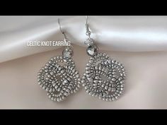 the earrings are made with silver beads