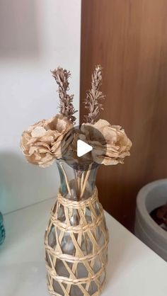 a vase that has some flowers in it