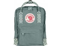 Fjallraven Kanken Mini Backpack Frost Green/Chess Pattern One Size F23561-664-904. The Mini-version is suitable for small children as well as for full grown adults who are looking for a small backpack. It is perfect for carrying a change of clothes for preschool or food on an outing and as a smart everyday bag for books water bottles fruit and more. The shoulder straps are long and adjustable and fit both small and big backs. They can be fastened with a clasp so that they are not in the way when Fjallraven Kanken Backpack Aesthetic, Kanken Backpack Aesthetic, Fjallraven Kanken Mini, Backpack Aesthetic, Backpack Fjallraven, Kanken Mini, Fjällräven Kånken, School Pack, Laptop Rucksack