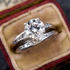 an engagement ring in a velvet box