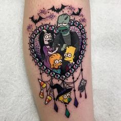 the simpsons family is depicted on this thigh piece by tattoo artist mike krabs