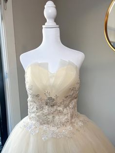 This gown is finished with shimmering tulle, beaded sequins and a corset top for a snug, perfected fit. It can be worn with or without a petti coat (which is not included). Item will arrive folded in a dress bag. If you decide this is the dress for your big day: We advise steaming the dress to get any creases out due to being folded for shipping. Feel free to contact us with any questions. Fitted Quinceanera Dress With Corset Back For Prom Season, Quinceanera Dress With Sequins And Fitted Bodice For Prom, Fitted Quinceanera Dress With Sweetheart Neckline For Pageant, Fitted Organza Quinceanera Dress For Prom Season, Fitted Quinceanera Dress With Corset Back And Sweetheart Neckline, Fitted Tulle Quinceanera Dress With Corset Back, Fitted Embellished Evening Dress For Quinceanera, Glamorous Corset Dress For Debutante Ball, Fitted Quinceanera Dress With Corset Back