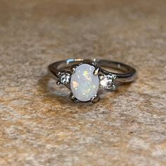 New Opal Style Costume Ring Add To A Bundle And I’ll Discount! Size 7 Made In China Engagement Rings Non Traditional, Costume Rings, Dream Jewelry, Opal Jewelry, Made In China, Womens Jewelry Rings, Christmas List, White Silver, Opal