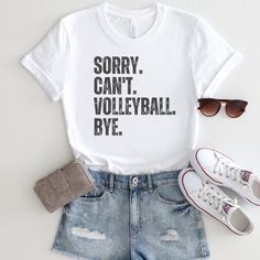 a t - shirt that says sorry can't volleyball bye with ripped shorts and sneakers