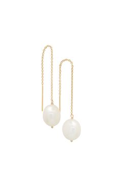 If you're looking to satisfy both the edgy and elegant woman in you, our Pearl Threaders are a versatile favorite. Expected shipping in 1-2 business days. * While we meticulously select pearls that are close in size to ensure a harmonious design, no two pearls are exactly alike. Each has a subtle differences in luster, hue and surface. These slight variations make each piece truly one-of-a-kind. ALL SALES ARE FINAL Classic Pearl Earrings, Buy Pearls, Pearl Earring, Sea Pearls, Pure Beauty, Gold Filled Chain, Elegant Woman, Freshwater Pearls, Circles