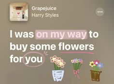 there are flowers that are on the wall and in the background is an advertisement for harry styles