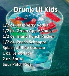 the drink list for drunk lil kids is displayed in a glass with ice and gummy bears