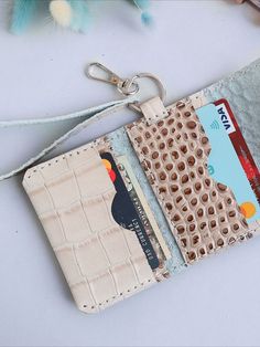 Handmade ivory wallet with wristlet keep your valuable cash and cards safe and secure, while providing convenience, accessibility, and style on the go. Cream Rectangular Coin Purse, Rectangular Cream Coin Purse, Cream Rectangular Wallets With Card Slots, Beige Wallets With Interior Card Slots, Beige Rectangular Trifold Wallet With Card Slots, Beige Rectangular Wallet With Interior Card Slots, Cream Bifold Wallet For Daily Use, Beige Rectangular Wallets With Interior Card Slots, Cream Wallets With Interior Card Slots For Daily Use