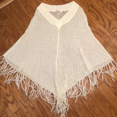 Lightweight Knit Poncho With Fringe From One Step Up. Received As A Gift. Never Worn. 55% Ramie 30% Acrylic 15% Mohair Casual Knitted Poncho For Spring, Cream Poncho For Beach In Fall, Cream Poncho For Fall Beach Trips, Casual Oversized Cream Poncho, Oversized Knitted Poncho For Spring, Casual Knit Poncho, Beige Knit Poncho For Spring, Casual One Size Knit Poncho, Cream Casual Poncho One Size