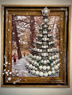 a painting of a christmas tree with white balls and snowflakes on the ground