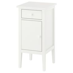 a small white cabinet with two drawers