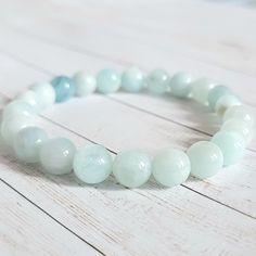 Handcrafted Bracelet Made With 8mm Genuine Aquamarine Gemstone Beads. Beads Are High-Quality, Genuine, And Natural Gemstones. Unisex. Will Discount If Bundled! Handcrafted Bracelets, Aquamarine Gemstone, Gemstone Bracelet, Womens Jewelry Bracelets, Bracelet Making, Aquamarine, Gemstone Beads, Natural Gemstones, Color Blue