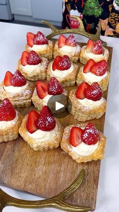 a wooden cutting board topped with mini desserts