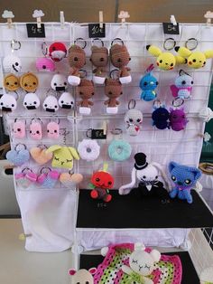 there are many crocheted stuffed animals on display