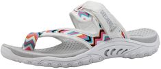 PRICES MAY VARY. Synthetic sole Adjustable Hook and Loop closure and 1 inch heel height Contoured and cushioned comfort footbed Lightweight flexible shock absorbing midsole Flexible rubber traction outsole The Skechers Reggae Zig Swag Active Sandal serves a cool look with a greater comfort experience. This thong sandal features the combination of a cushioned comfort footbed and traction outsole, creating a comfortable base to rest your feet. Lightweight White Sandals With Arch Support, Multicolor Synthetic Sandals With Arch Support, White Sport Sandals With Cushioned Footbed, Sporty Sandals With Gel Cushioning For Spring, Casual White Sandals With Gel Cushioning, Summer Sports Sandals With Gel Cushioning, Summer White Sandals With Gel Cushioning, White Sandals With Gel Cushioning For Summer, Spring Sports Sandals With Gel Cushioning