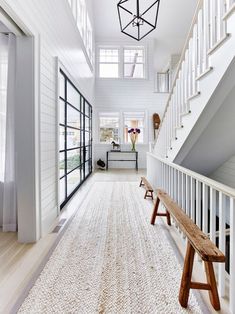 the instagram page on instagram shows an image of a hallway with stairs and windows