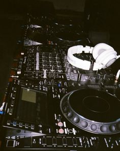 dj equipment with headphones on top of it