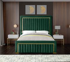 a bed with green velvet upholstered headboard and foot board in a bedroom