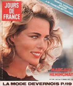 a magazine cover with a woman's face on the front and an advertisement for her hair