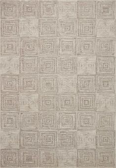 an area rug with squares and rectangles on the side, in grey tones